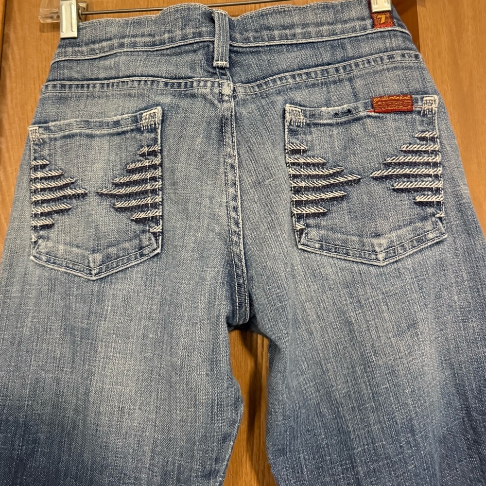Stylish Blue Denim Jeans with Distressed Pockets